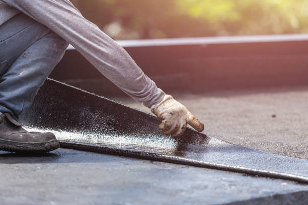 Professional Waterproofing technician working in Bayville, NY
